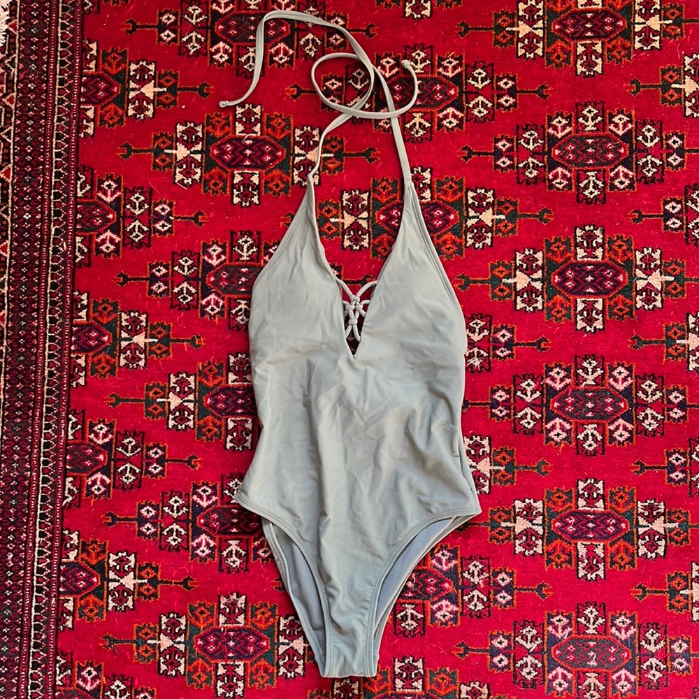 Green one piece bathing suit